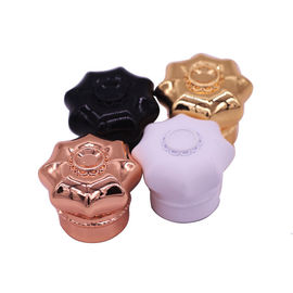 ซื้อ การออกแบบที่ไม่ซ้ำกันคริสตัลโลหะผสมสังกะสีน้ำหอมปกรูปดอกไม้มงกุฎโลหะ online manufacture